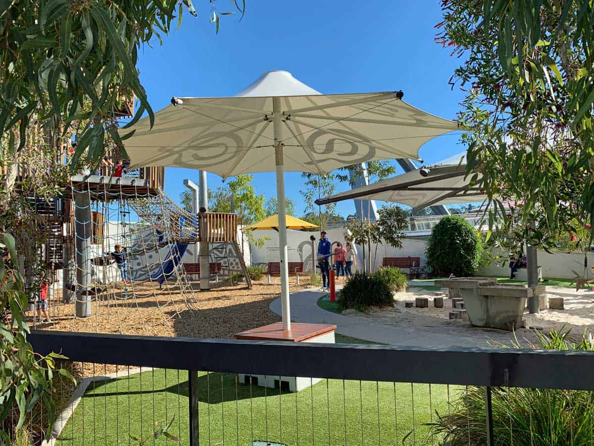 elizabeth quay playground with climbing net and wooden structure