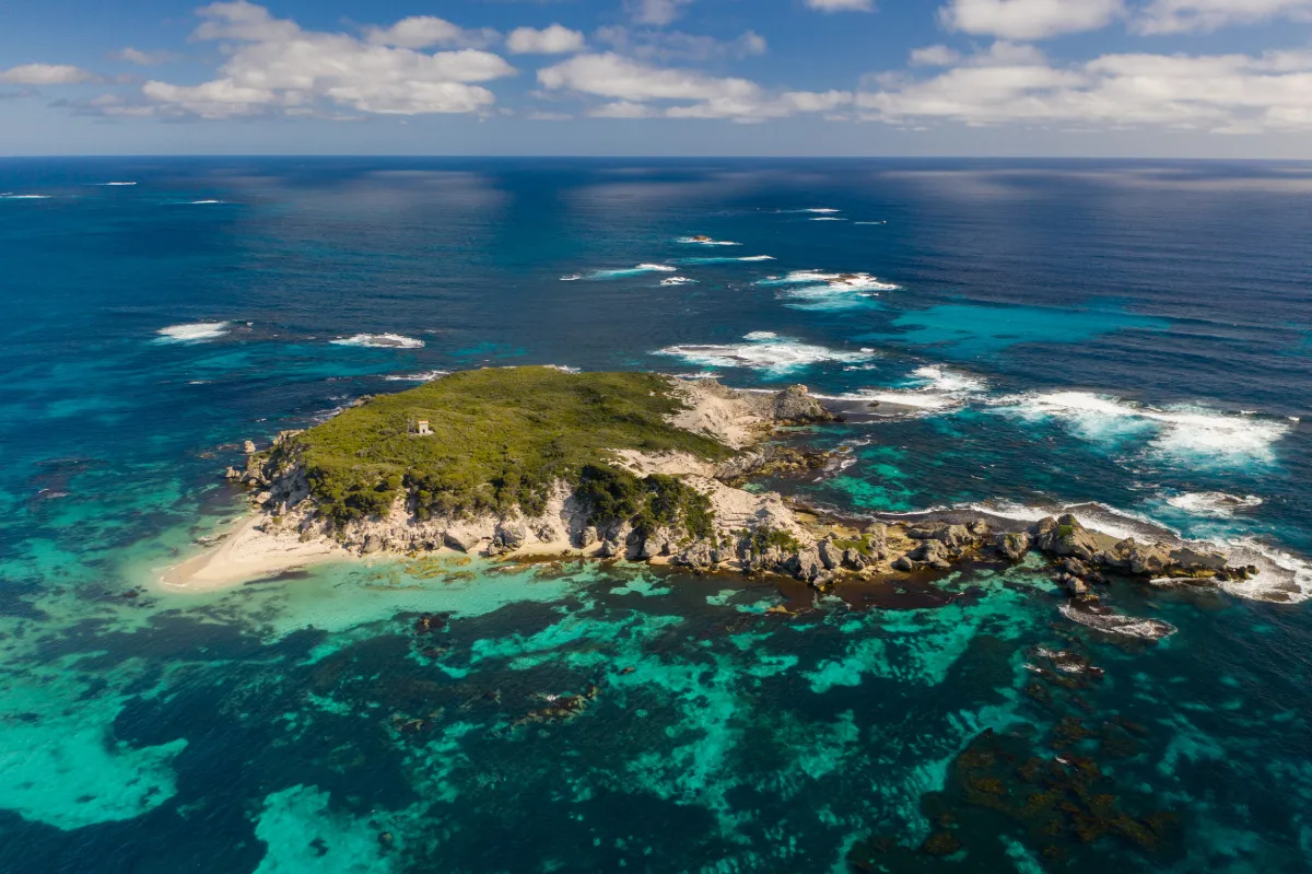 island surrounded by clear ocean